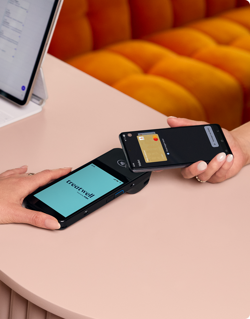 Contactless payment on a Treatwell Pay card machine showing transaction completed